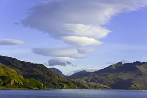 South Georgia, Cumberland Bay, lenticular clouds, autumn evening South Georgia, Cumberland Bay, lenticular clouds, autumn evening