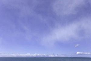 South Georgia, cumulus clouds over seascape, autumn South Georgia, cumulus clouds over seascape, autumn