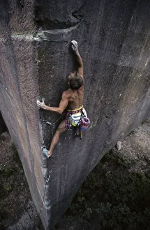 Sports climber on the difficult Avalon route in Unterabtsteinach, Odenwald, Hesse, Germany, Europe Sports climber on the difficult Avalon route in Unterabtsteinach, Odenwald, Hesse, Germany, Europe