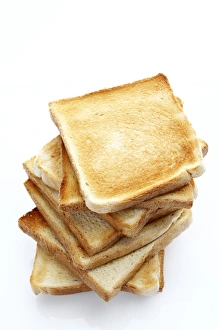 Stacked slices of toast, toasted slices of bread Stacked slices of toast, toasted slices of bread