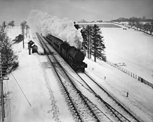Railroad Track Collection: Steam Train In Snow