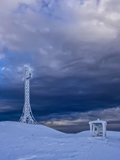 Summit cross and a small hut covered with hoarfrost, Monte Catria, Apennines, Marche Summit cross and a small hut covered with hoarfrost, Monte Catria, Apennines, Marche
