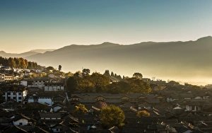 Sunrise on Lijiang Old Town , Yunnan , China Sunrise on Lijiang Old Town , Yunnan , China