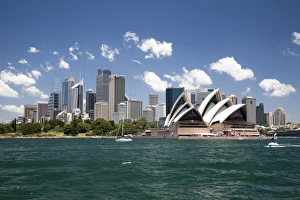 Sydney Opera House in Sydney Harbor with downtown skyline, Sydney, New South Wales, Australia Sydney Opera House in Sydney Harbor with downtown skyline, Sydney, New South Wales, Australia