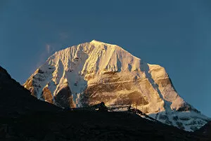 Rock Collection: Tibetan Buddhism, snow-capped sacred Mount Kailash, or Gang Rinpoche, pilgrims trail, Kora, Ngari
