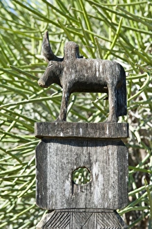 Totem carved from wood, bull, arboretum of Tulear or Toliara, Madagascar Totem carved from wood, bull, arboretum of Tulear or Toliara, Madagascar