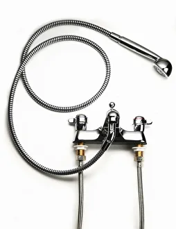 Two-hole mixer tap with shower attachment Two-hole mixer tap with shower attachment
