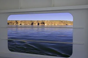 USA, Utah, Lake Powell and sandstone bluffs, view from ferry window USA, Utah, Lake Powell and sandstone bluffs, view from ferry window