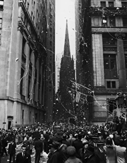 VE Day In New York; corner of Wall Street and Nassau Street in New York City during VE Day In New York; corner of Wall Street and Nassau Street in New York City during