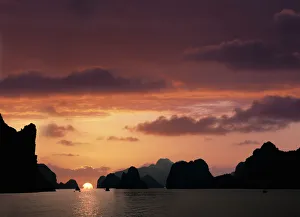 Vietnam, Halong Bay, sunset (Digital Enhancement) Vietnam, Halong Bay, sunset (Digital Enhancement)