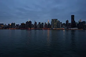 View of East River and midtown Manhattan at night View of East River and midtown Manhattan at night