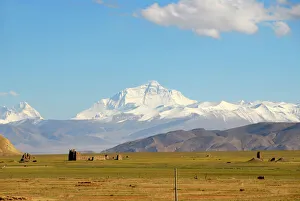 View towards the entire massif of Mount Everest, ruins in the valley near Old Tingri, Himalayas, Central Tibet, U-Tsang View towards the entire massif of Mount Everest, ruins in the valley near Old Tingri, Himalayas, Central Tibet, U-Tsang
