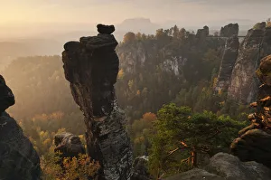 View from the Hoellenhundaussicht view over the Wehlgrund valley to the Bastei rock View from the Hoellenhundaussicht view over the Wehlgrund valley to the Bastei rock