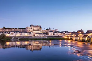The walled town and Chateau of Amboise reflected in the River Loire in the evening, Amboise, Centre, France The walled town and Chateau of Amboise reflected in the River Loire in the evening, Amboise, Centre, France