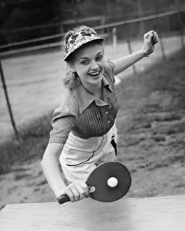 Woman playing table tennis, (B&W) Woman playing table tennis, (B&W)
