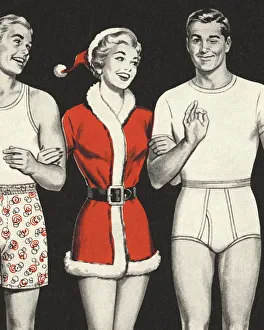 Woman in Santa Outfit with Two Men in Underwear Woman in Santa Outfit with Two Men in Underwear