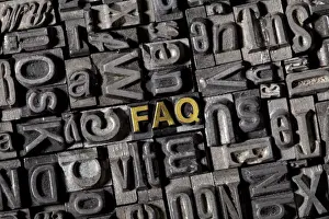 Lead Type Print of the Word FAQ
