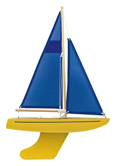 Yellow toy sailing boat with blue sail, front view Yellow toy sailing boat with blue sail, front view