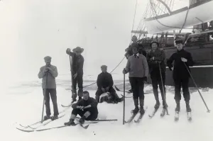 Group of officers on floe alongside ship in pack ice Group of officers on floe alongside ship in pack ice