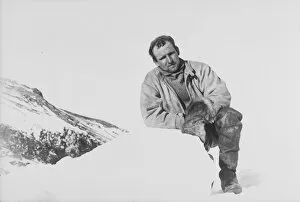 Images Dated 19th February 2016: Raymond Priestley leaning on a lump of ice