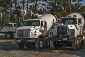 3 x cement mixers parked up on waste ground on Manitoulin Island Ontario Canada 3 x cement mixers parked up on waste ground on Manitoulin Island Ontario Canada