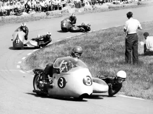 Assen, Holland: A scene from the sidecar TT here on June 25th: front to back, Edgar Strub Assen, Holland: A scene from the sidecar TT here on June 25th: front to back, Edgar Strub