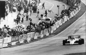 Brands Hatch, July 21st Austrias Niki Lauda takes the chequered flag to win the Brands Hatch, July 21st Austrias Niki Lauda takes the chequered flag to win the