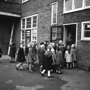 Children arriving at Jessop Primary School, Herne Hill, SE London 12th January 1961 Children arriving at Jessop Primary School, Herne Hill, SE London 12th January 1961