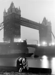Courting couple 40s/50s with Tower Bridge in background love couple romance romantic Courting couple 40s/50s with Tower Bridge in background love couple romance romantic