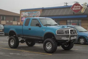 A customized Ford F150 with big wheels and tyres outside a Dairy Queen fast food A customized Ford F150 with big wheels and tyres outside a Dairy Queen fast food