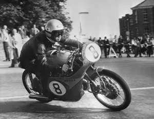 The fastest member of the Japanese team Taniguchi, rides a Japanese Honda 125 cc The fastest member of the Japanese team Taniguchi, rides a Japanese Honda 125 cc
