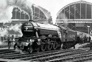 Railway Collection: The Flying Scotsman pulls out of Londons Kings Cross station to make the last
