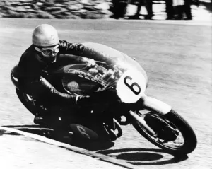 Gary Hocking, riding his MV Agusta into second place at the 350cc class in the Junior Gary Hocking, riding his MV Agusta into second place at the 350cc class in the Junior