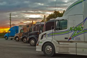 A great selection of trucks parked up at dusk on a Ontario service station SW of A great selection of trucks parked up at dusk on a Ontario service station SW of