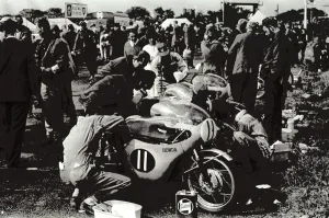 Isle of Man: Mechanics at work in the pits ofn the Japanese honda machines before Isle of Man: Mechanics at work in the pits ofn the Japanese honda machines before