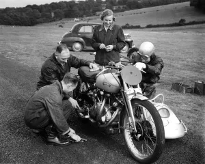 John Surtees and his family and friends get down to some motorbike maintenance at a race John Surtees and his family and friends get down to some motorbike maintenance at a race