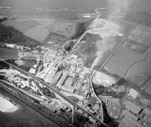 The lane stretching into the centre alongside the chimneys is Lovers Lane. The cement works The lane stretching into the centre alongside the chimneys is Lovers Lane. The cement works