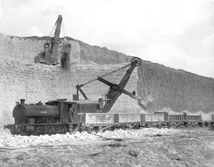 Mechanical excavators loading chalk directly onto railway trucks for the short run Mechanical excavators loading chalk directly onto railway trucks for the short run