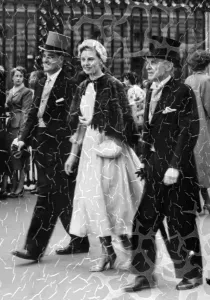 Mr Lionel Logue, the specialist in speech defects, arriving with his eldest son Mr Laurie Logue Mr Lionel Logue, the specialist in speech defects, arriving with his eldest son Mr Laurie Logue