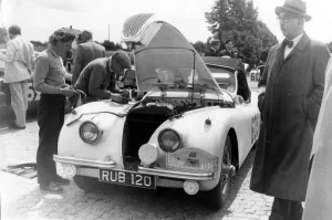 Munich: British driver Ian Appleyard services his Jaguar car at the Munich check Munich: British driver Ian Appleyard services his Jaguar car at the Munich check