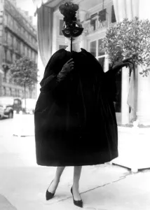 Paris: Reminiscent of the Venetian Domino is this evening cloak, entitled Panach, by Yves St Paris: Reminiscent of the Venetian Domino is this evening cloak, entitled Panach, by Yves St