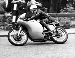 South African Jim Redman at Quarter Uridge on the first lap of the senior TT race South African Jim Redman at Quarter Uridge on the first lap of the senior TT race
