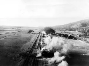 Steam pouring from the engine after the boiler had blown up following an attack by Steam pouring from the engine after the boiler had blown up following an attack by