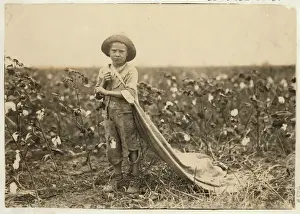 6-year old Warren Frakes with about 20 pounds of cotton in his bag at Comanche County 6-year old Warren Frakes with about 20 pounds of cotton in his bag at Comanche County