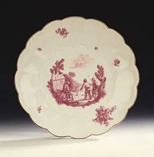 A Chelsea large fluted circular dish painted with three peasants playing marbles after A Chelsea large fluted circular dish painted with three peasants playing marbles after