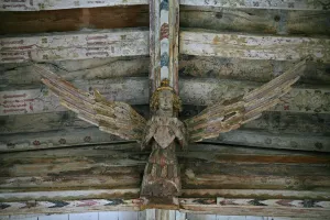 Depicting a view of one of the carved wooden angels in the nave Depicting a view of one of the carved wooden angels in the nave