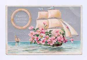 Edwardian Christmas postcard of a galleon filled with dog rose flowers, c Edwardian Christmas postcard of a galleon filled with dog rose flowers, c