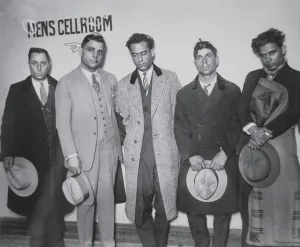 Joe Aiello (1891-1930) with his henchmen in police custody, 1928 (b/w photo) Joe Aiello (1891-1930) with his henchmen in police custody, 1928 (b/w photo)
