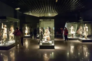 Museum; standing warriors painted with original colour in glass display cases Museum; standing warriors painted with original colour in glass display cases