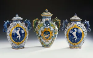 A pair of Montelupo armorial two-handled oviform vases and a wet-drug jar (ceramic) A pair of Montelupo armorial two-handled oviform vases and a wet-drug jar (ceramic)